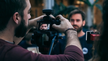 Cameraman filming onlocation corporate video